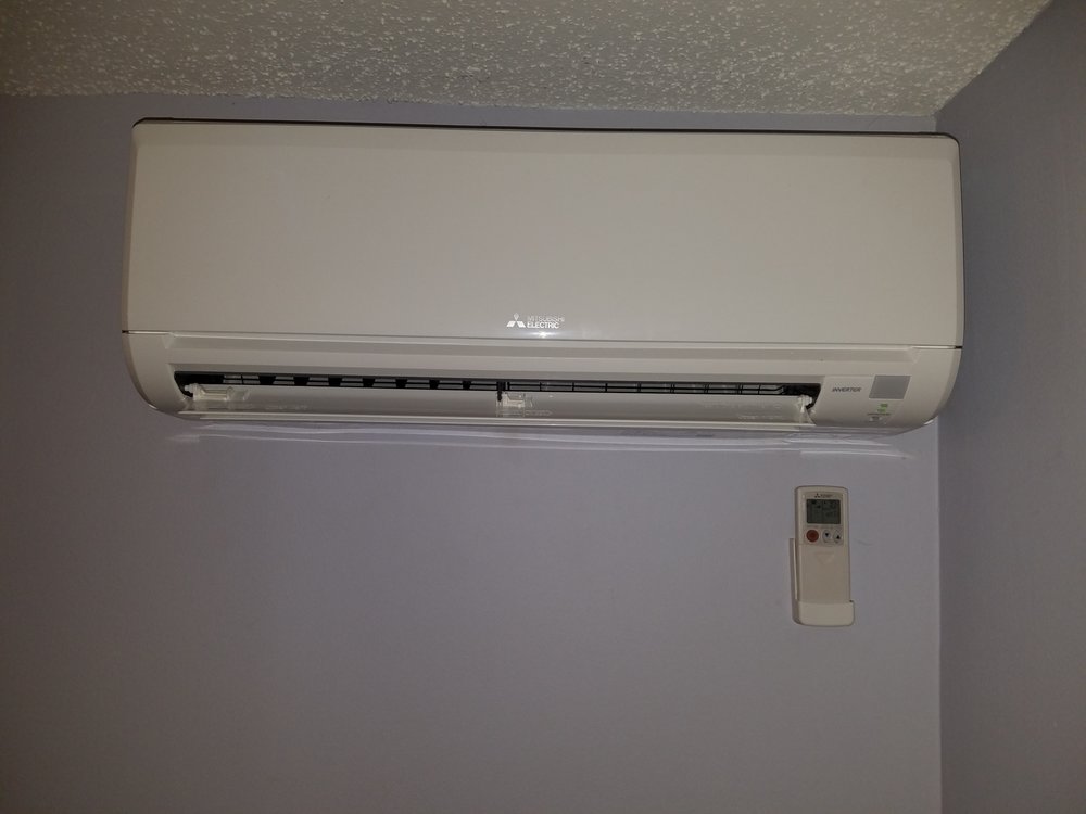 Interior home AC unit ductless mounted on wall
